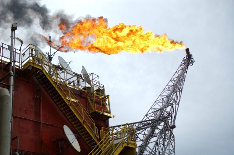 Flare boom on offshore oil rig in the North Sea