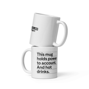 'Hold power to account' mug
