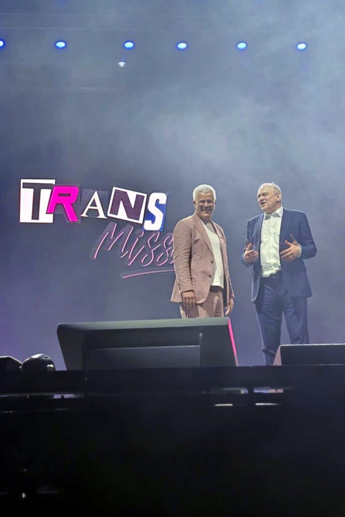 Photo of Jo Maugham speaking to Ed Davey onstage at Trans Mission